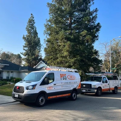PDS Plumbing and Air Van Parked Outside